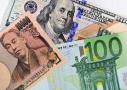 Dollar set for weekly drop as traders cut wagers on rate hikes