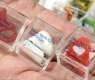 Artist Sells Trash Collected Outside Taylor Swift's Wedding Venue as Collectibles
