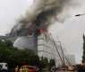 Korean firefighters battle Coupang warehouse blaze for third day