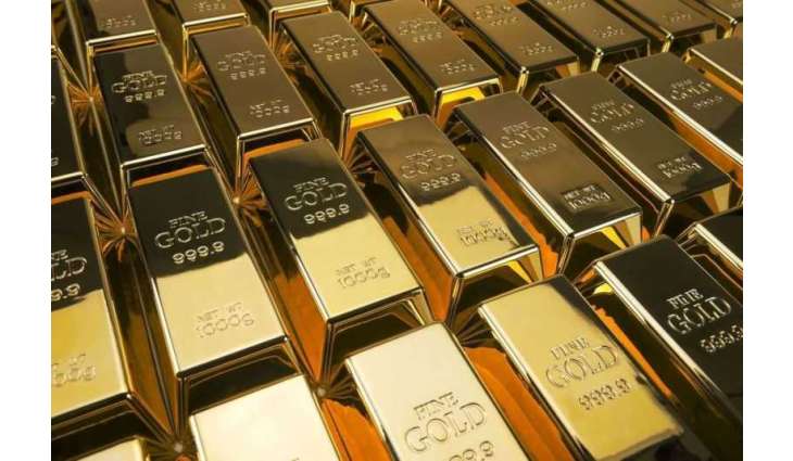 Gold slides over 1% on Monday